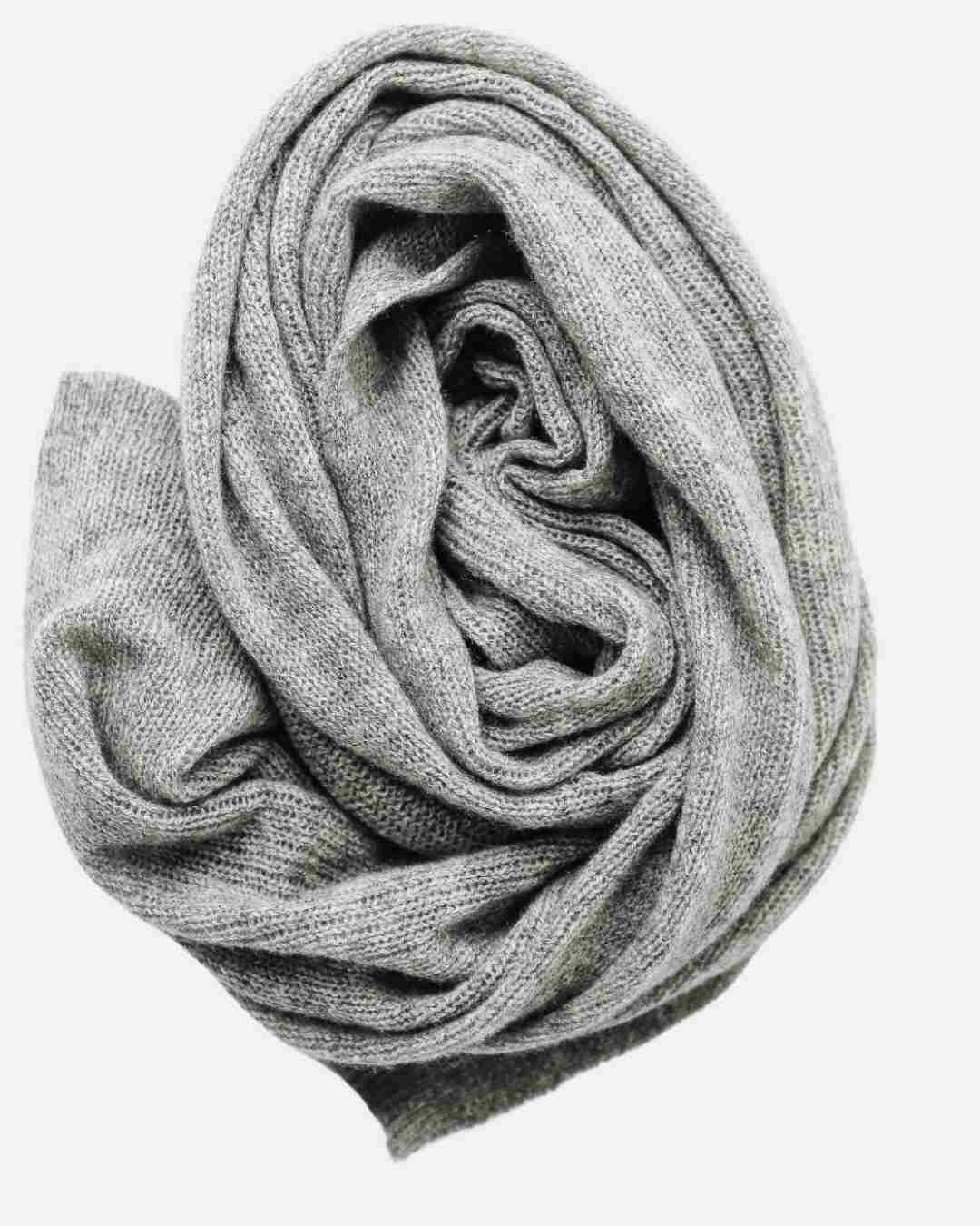 Luxury lightweight cashmere wrap in light gray, perfect for layering and all-season use