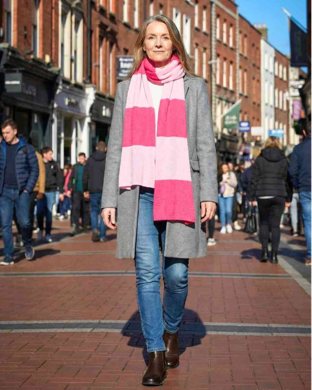 Wearwith peony and fuchsia pink cashmere featherlight stripe scarf worn on Dublin street