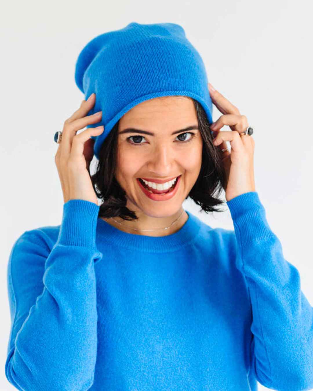 Front view of a soft, cobalt azure blue 100% cashmere slouchy beanie hat from the 2026 collection