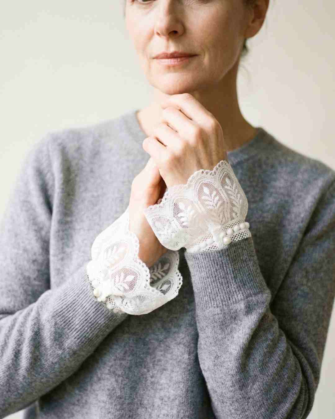 Women wearing detachable white lace shirt cuffs accessory styled with tailored blouse – Wearwith